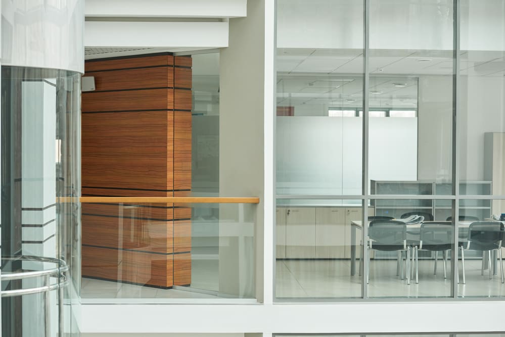Interior view of a modern office building with glass walls